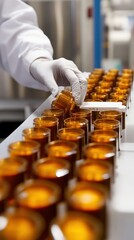 Technician inspects battery cells to ensure quality standards are upheld in production