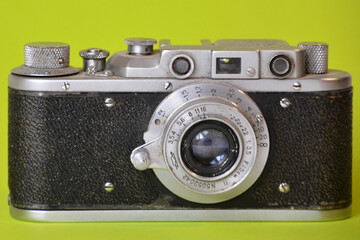 Old camera. Film camera. Monochrome background and camera.