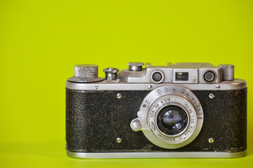 Old camera. Film camera. Monochrome background and camera.