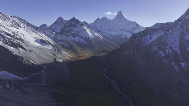 Aerial view of Daocheng Yading, Sichuan, China in yellow leave season.