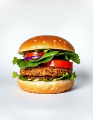 Delicious veggie burger with lettuce, tomato, and onion, ready to eat