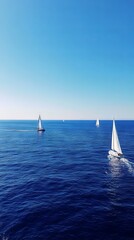 Obraz premium Sailing On A Calm Ocean: Beautiful Blue Sea And Sky