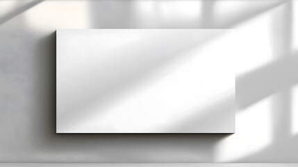 A clean white background with a single, soft shadowed rectangle in the center, perfect for overlaying text.