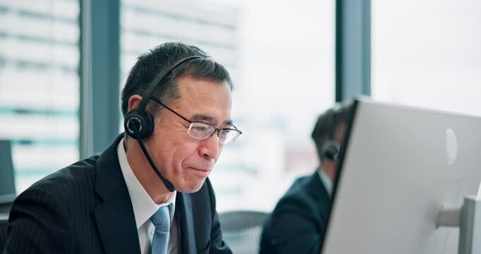 Asian man, consultation and talking with headphones at call center for customer service or telecommunications. Businessman, japanese broker or agent consulting with technology for financial advice