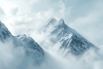 Majestic Snow-Capped Mountain Peaks Enveloped in Clouds: A Breathtaking Winter Landscape