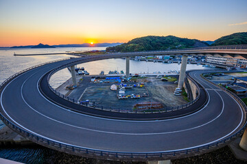 初秋の牛深ハイヤ大橋から見た朝日　熊本県天草市　The sunrise seen from...