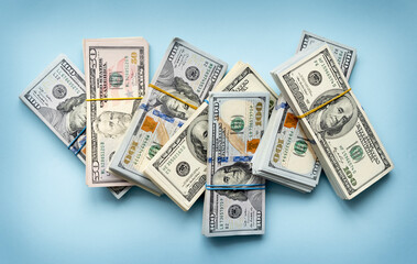 Banner a pile of one hundred US banknotes, cash of hundred dollar bills, dollar background