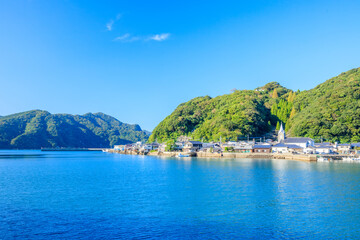 初秋のカトリック﨑津教会と街並み　熊本県天草市　Catholic Sakitsu Church and cityscape in early autumn. Kumamoto Pref, Amakusa City.