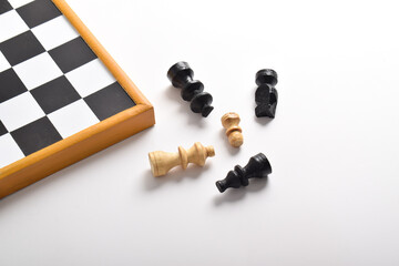 Close-up of Chess pieces on a white background