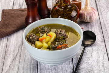Soup with beef meatballs and vegetables
