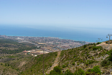 Fototapeta premium Panoramic View of Benalmádena Hills and Mediterranean Coastline in Málaga
