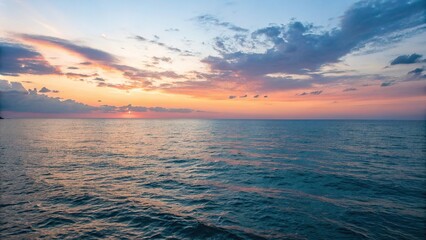 Obraz premium Peaceful blue ocean scene at sunset with sky, oceanic view, blue watercolor painting, soothing colors, wavy surface, serene landscape