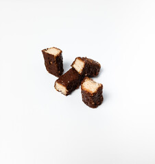 Slice of chocolate wafer. The taste is so sweet, pass for chill out and fulfilling. Isolated white background