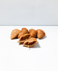 Cireng filled with shredded chicken. It tastes spicy and delicious with a white background