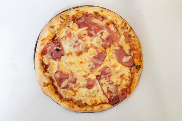 Hawaiian Pizza 9 inch, special kebab and fat burger and fries isolated on a white background