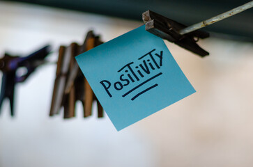 Motivational Word In A BlueSquare Paper Outdoor Composition