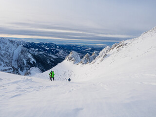 alpinist climbing the mountain