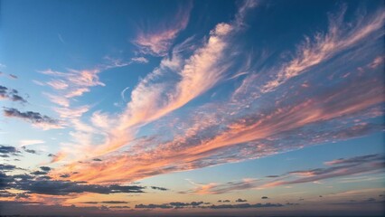 Obraz premium Delicate wisps of cloud drift lazily across the cerulean sky at sunset, leaving behind a trail of soft pink and orange hues, trail, pink, orange