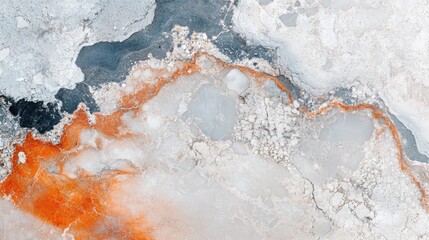 Naklejka premium Elegant abstract marble texture featuring a blend of white tones with striking orange and black highlights resembling natural stone surfaces.