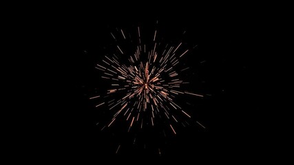 Fototapeta premium Small fire sparks radiating from a central point on a dark surface, pyrotechnic, smoldering ember, burning effect