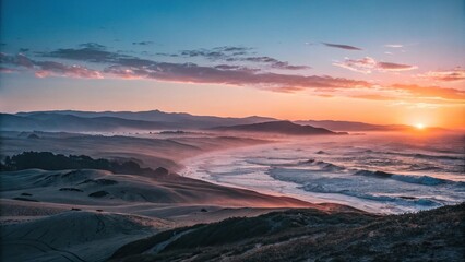 The sun rises slowly over the rolling hills and waves of the ocean at morning break, ocean horizon, soft focus, peaceful scene, gentle sunrise