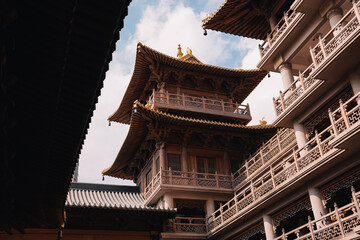 Fototapeta premium Horizontal view of Chinese traditional building in the Jingan Temple, in the center of Shanghai, China