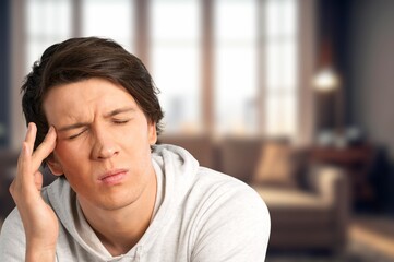 Headache, young man with pain for dizziness