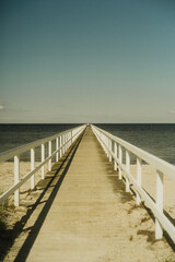 wooden bridge over the sea
