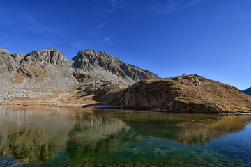 the lower Valfredda lake, a small body of water located in the Ayas Valley, above the Arp refuge.
