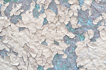 Texture of the stone wall with peeling paint, peeling paint texture on the concrete wall