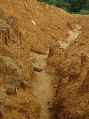 pile of small stones on a stretch of yellow earth