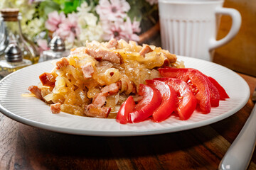 Stewed onion with sausage.