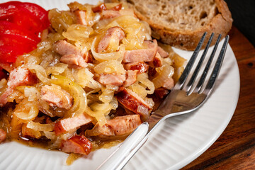 Stewed onion with sausage.