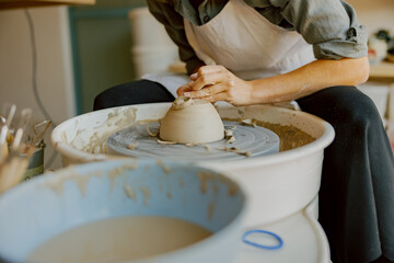 Artisan pottery making takes place in a dedicated and creative studio environment