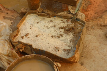 Preparing clay for making traditional pots like kulhad, katori, and diya, highlighting the initial...