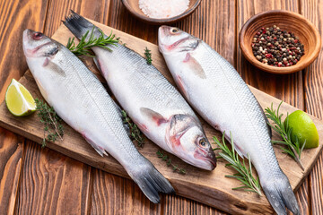 Raw sea bass fish photography . Top view