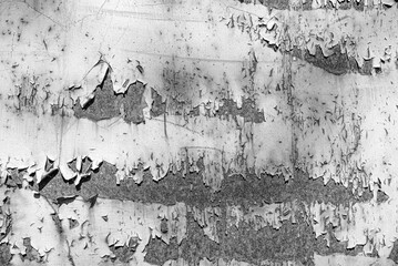 Old peeling paint on the wall as an abstract background.