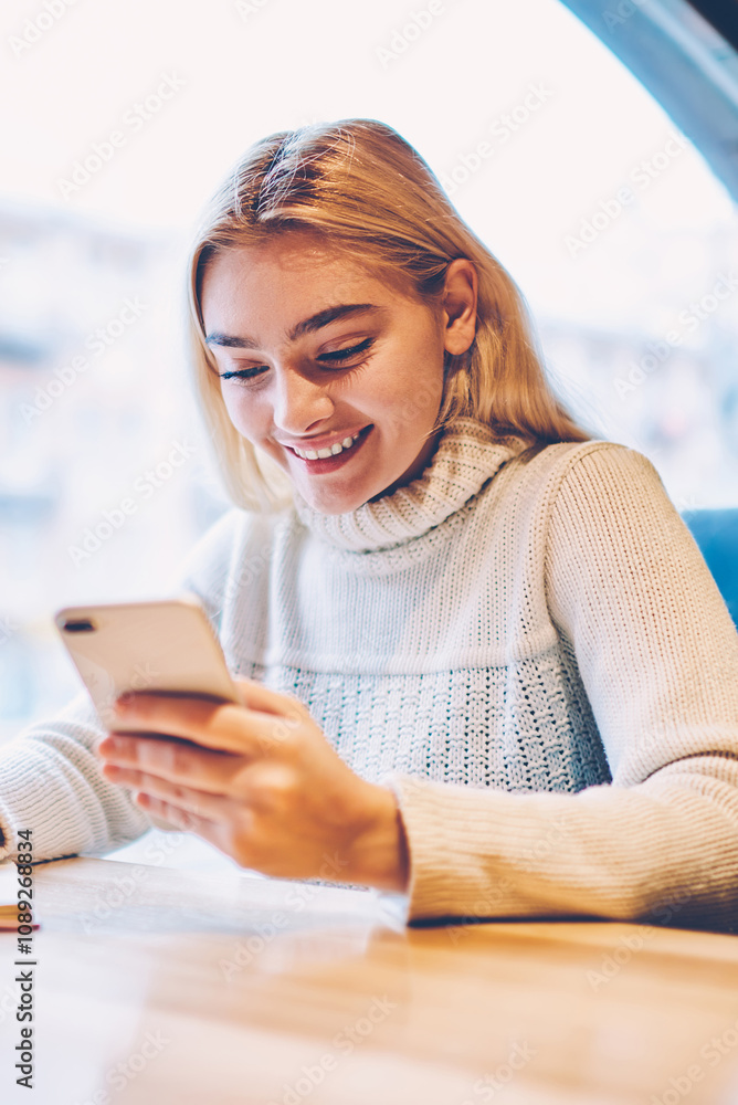 Poster cheerful female blogger satisfied with getting likes for publication in network holding cellular for
