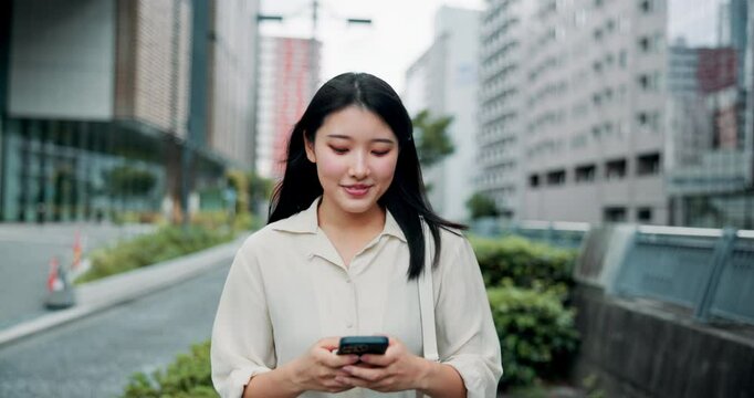 Japanese, woman and travel with smartphone in city, scroll or sightseeing with application for direction. Urban, female person and smile with mobile for online map, check location or walking in Tokyo