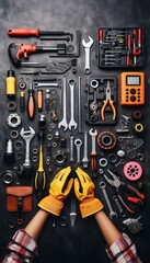 Different auto mechanic's tools on grey table, flat lay