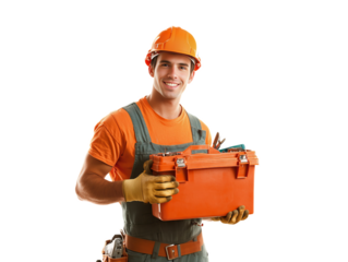 A man in an orange shirt and a hard hat is holding a toolbox. He is smiling and he is happy
