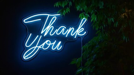 Neon "Thank You" sign glowing brightly on a dark background  perfect for expressive appreciation - Powered by Adobe