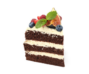 Piece of delicious chocolate sponge cake with berries isolated on white