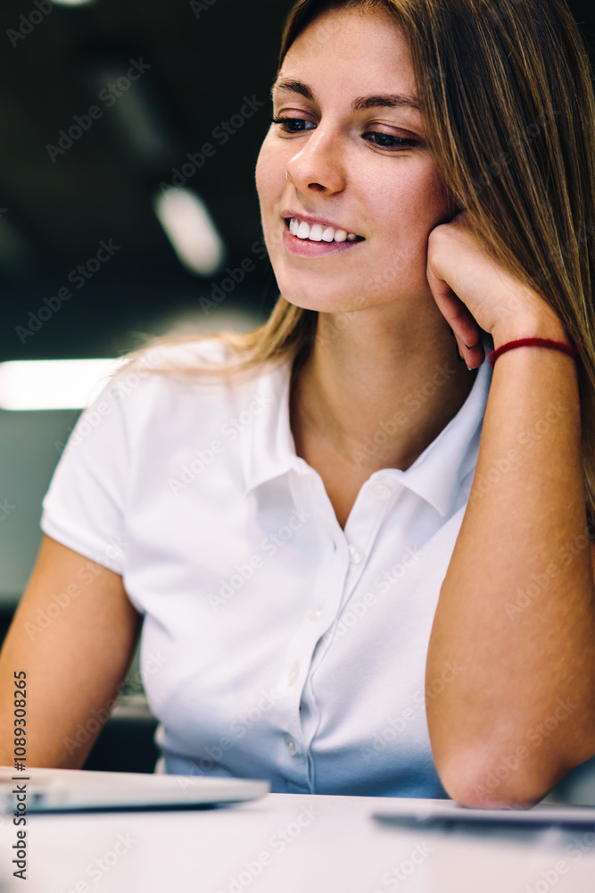 Poster smiling young woman watching video on laptop computer connected on wifi, positive female student enj