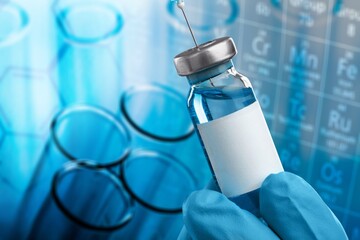 Covid-19 vaccine vial with a syringe. RNA vaccines