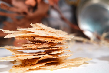 Tarhana cips, crispy snacks a traditional turkish fermented soup base made into crunchy chips made of youghurt and cereals, dried in sun