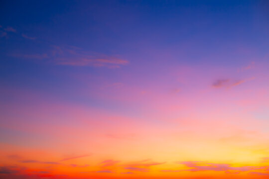 Orange sky and clouds background,Beautiful of luxury soft gradient orange gold clouds and sunlight on the blue sky perfect for the background, take in everning,Twilight