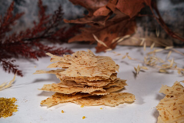 Tarhana cips, crispy snacks a traditional turkish anatolian fermented soup base made into crunchy chips made of youghurt and cereals, dried in sun