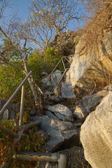 Hiking trail adventure rocky terrain scenic viewpoint nature exploration early morning outdoor activity