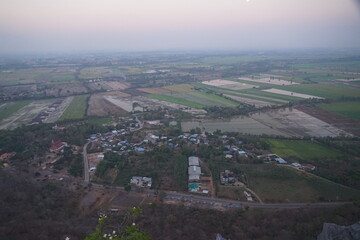 Breathtaking sunset view over rolling fields scenic overlook aerial perspective tranquil landscape nature's serenity
